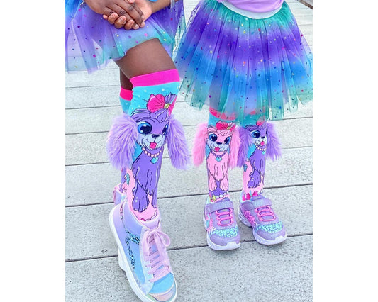 Salut, je m'appelle Coco et j'habite au pays des merveilles des chaussettes colorées. 